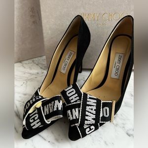 JIMMY CHOO
Tegan 100 suede pumps logo tape bow on toe